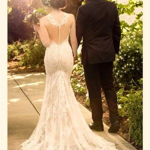 Martina Liana 948 unaltered, size 10 wedding dress brand new in garment bag.